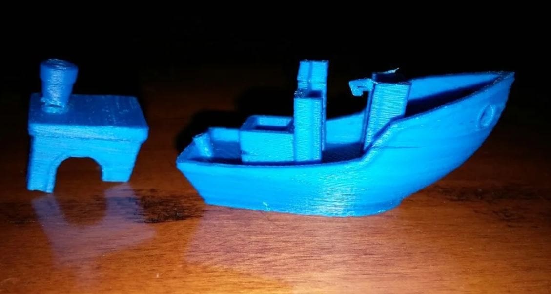 Poor layer adhesion can be partially solved by raising or maintaining the nozzle temperature inbetween switching filaments