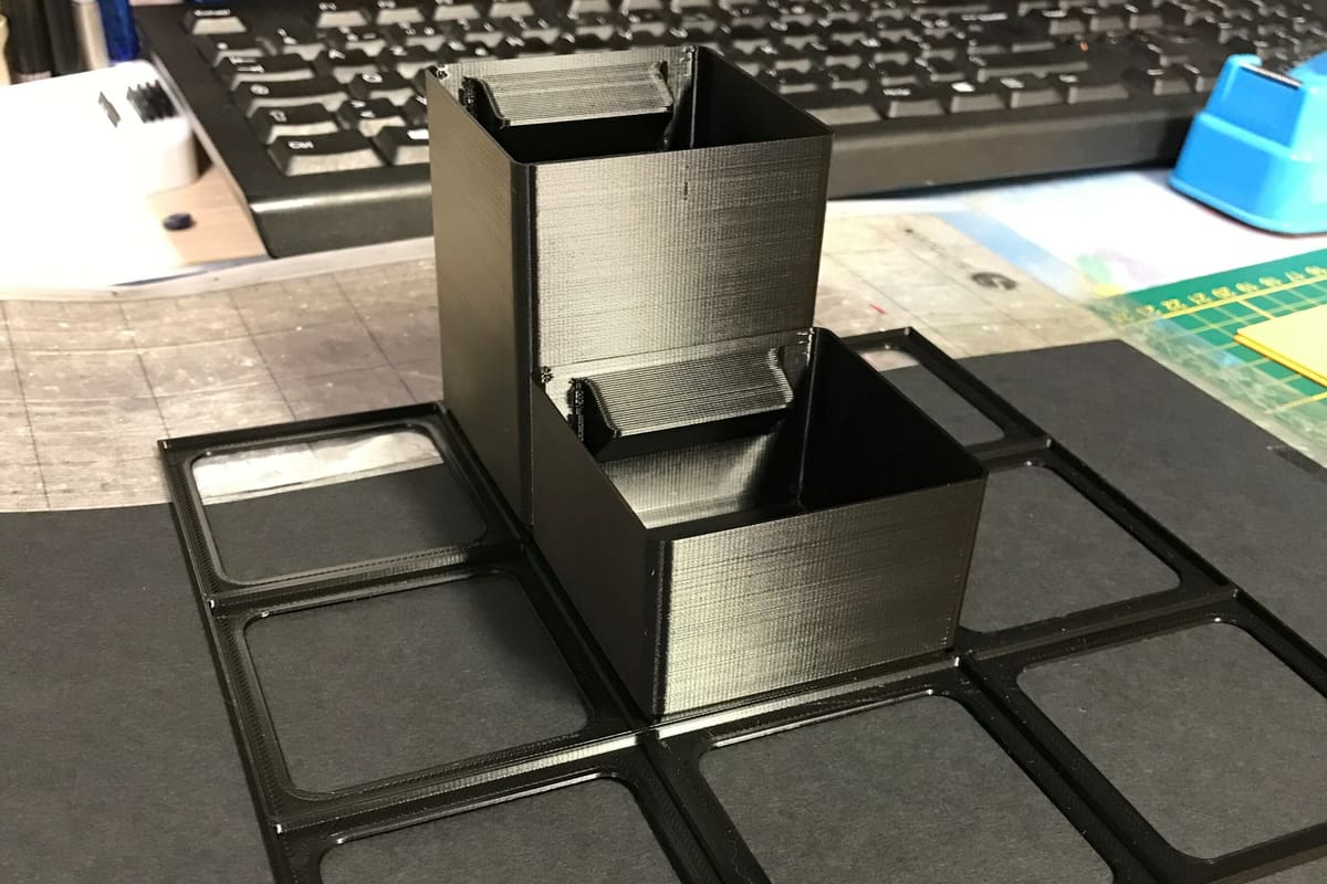 The grid means you can combine your choice of boxes to form a desk or drawer organizer