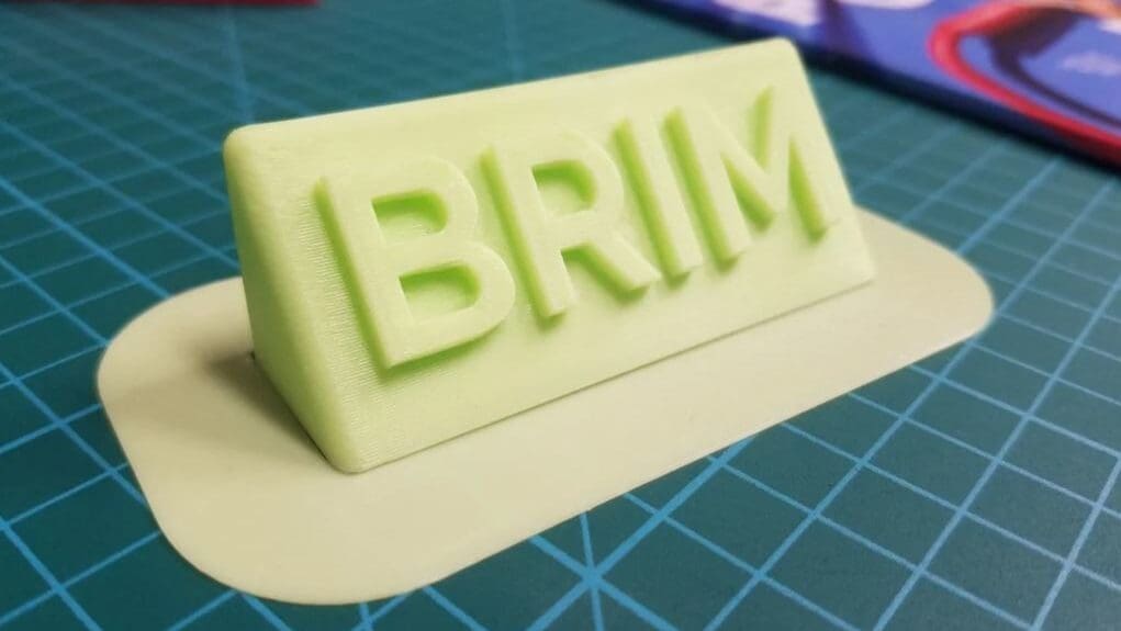 Brims provide a good balance between material consumption and bed adhesion