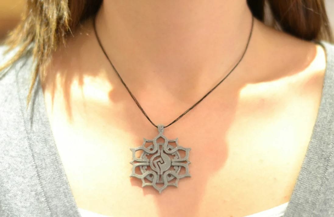 This Mayan symbol pendant was printed in PLA