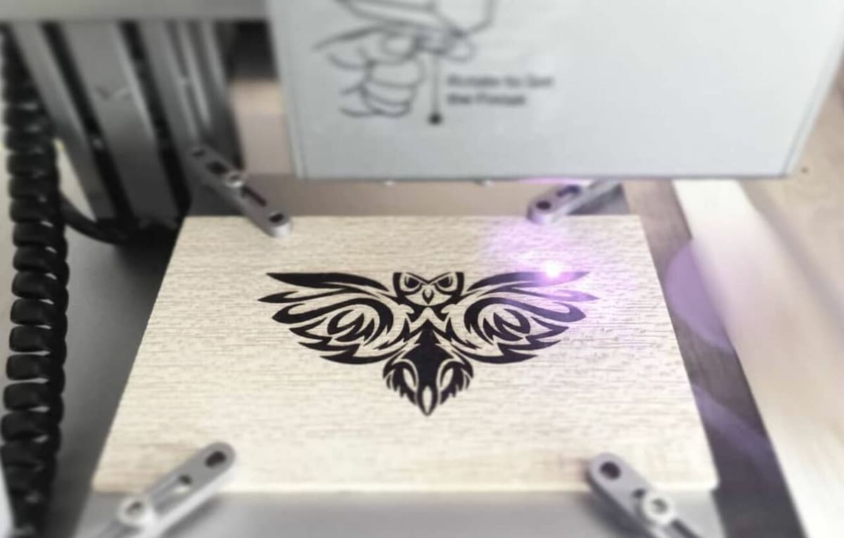 You can use EPS files to turn a drawing into G-code for laser engraving