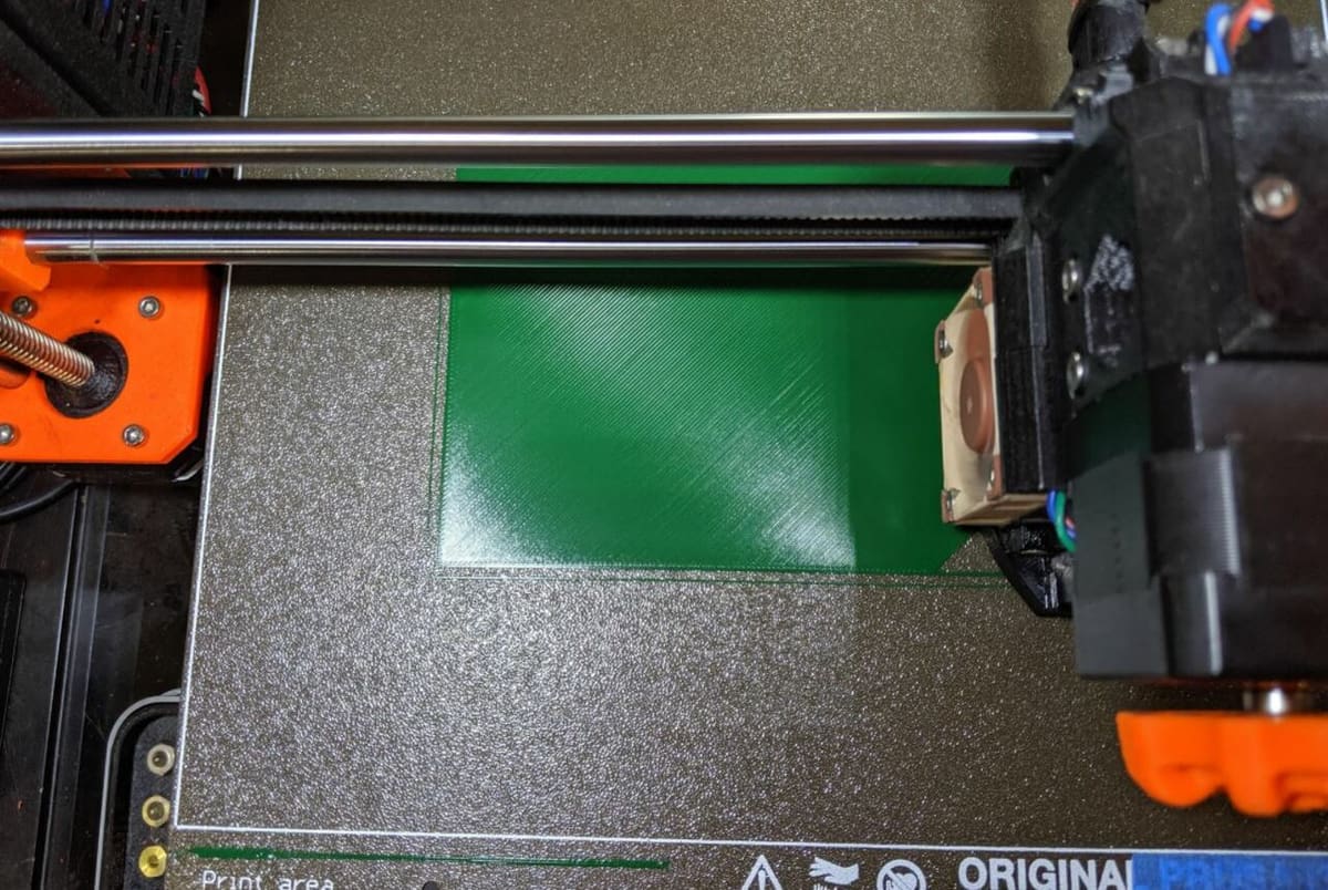 A textured PEI sheet doesn't require glue, but prints will have a rough texture on the bottom