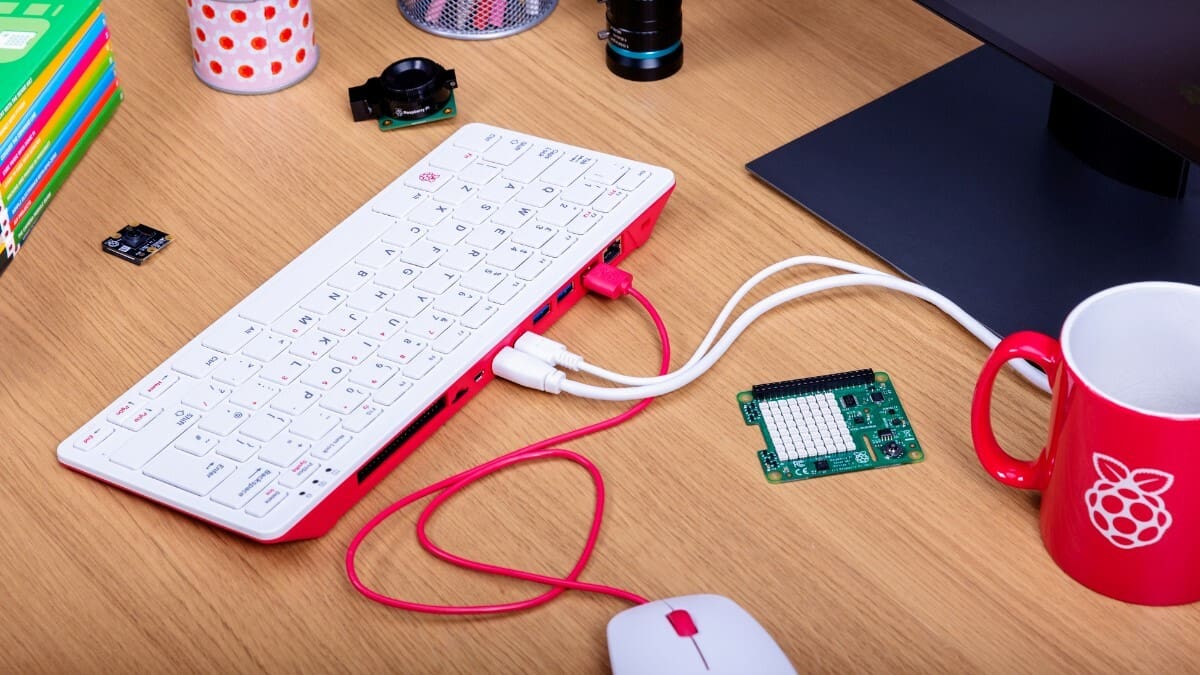 While the Pi 400 doesn't have a screen, it is a portable Raspberry Pi with available GPIO access