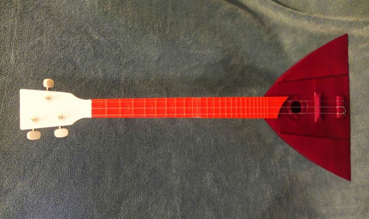 You'll need two nylon strings and one steel one for a traditional balalaika