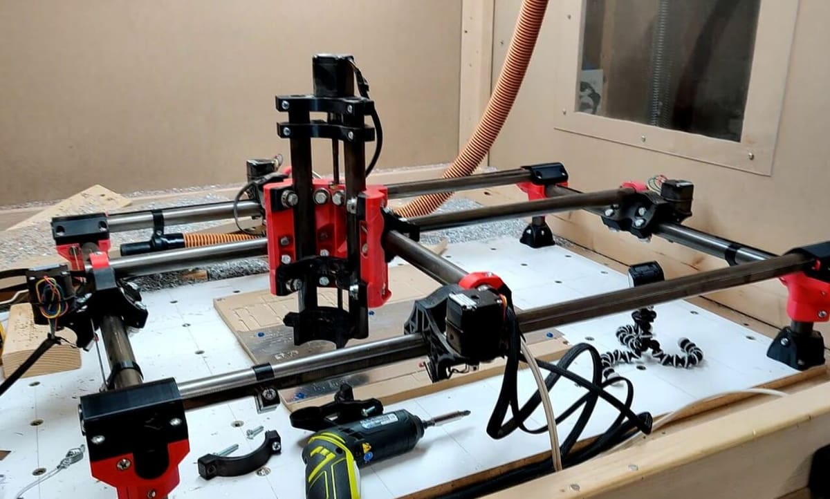 The MPCNC moves components via conduit rail rods with belts and carriages