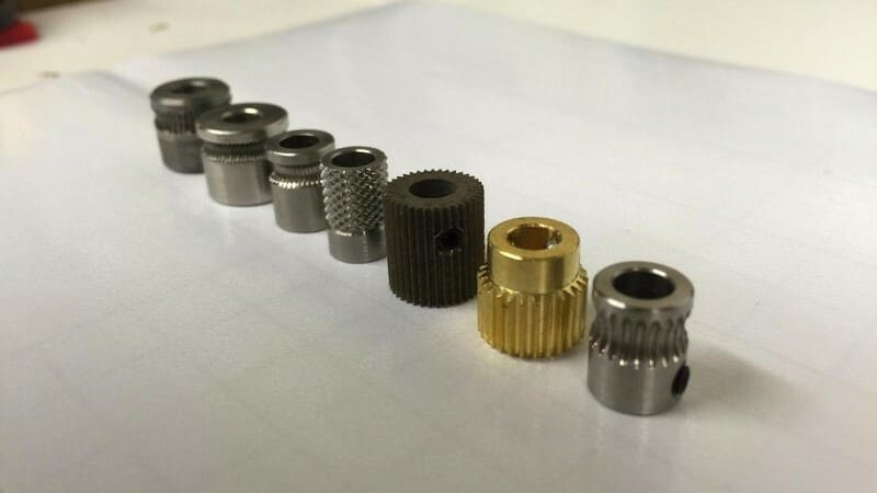 The filament you print with can influence what material you want the extruder gear to be made out of