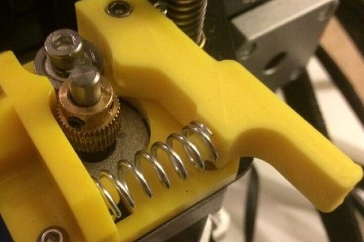 You can swap the extruder spring with one that has slightly better stiffness