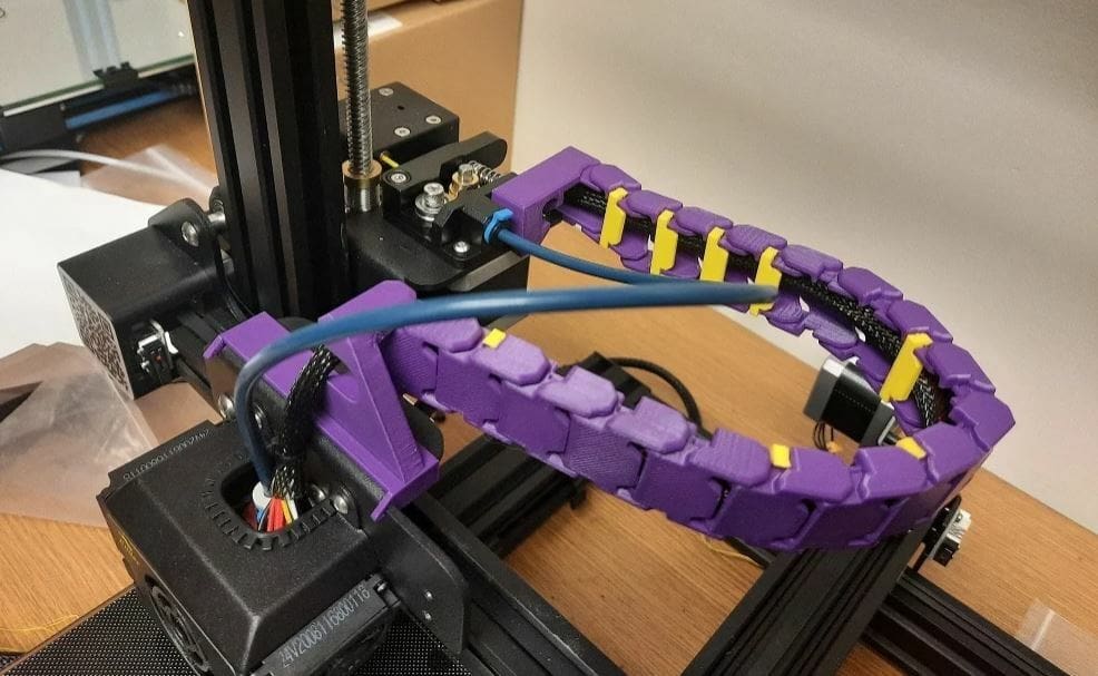 This cable chain prevents the hot end wires from dipping beneath the nozzle