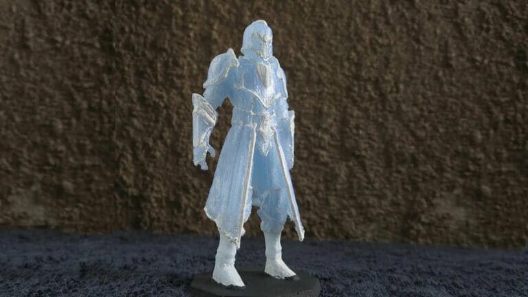 A daunting warrior miniature, with a sword to swing and honor to defend