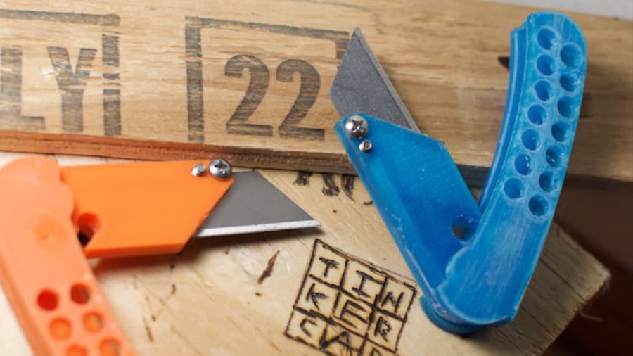 A Hobby knife that, apart from the blade a few screws, was all modeled in Tinkercad