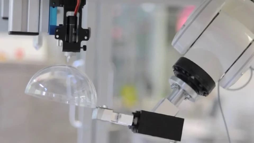 A 6-axis AJ system printing on a dome