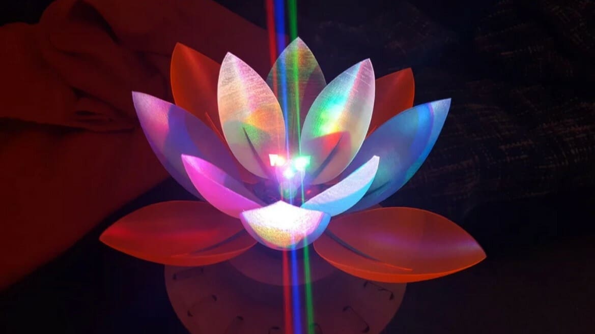 An illuminated lotus with movable petals, made with an Arduino Uno, servos, and LEDs