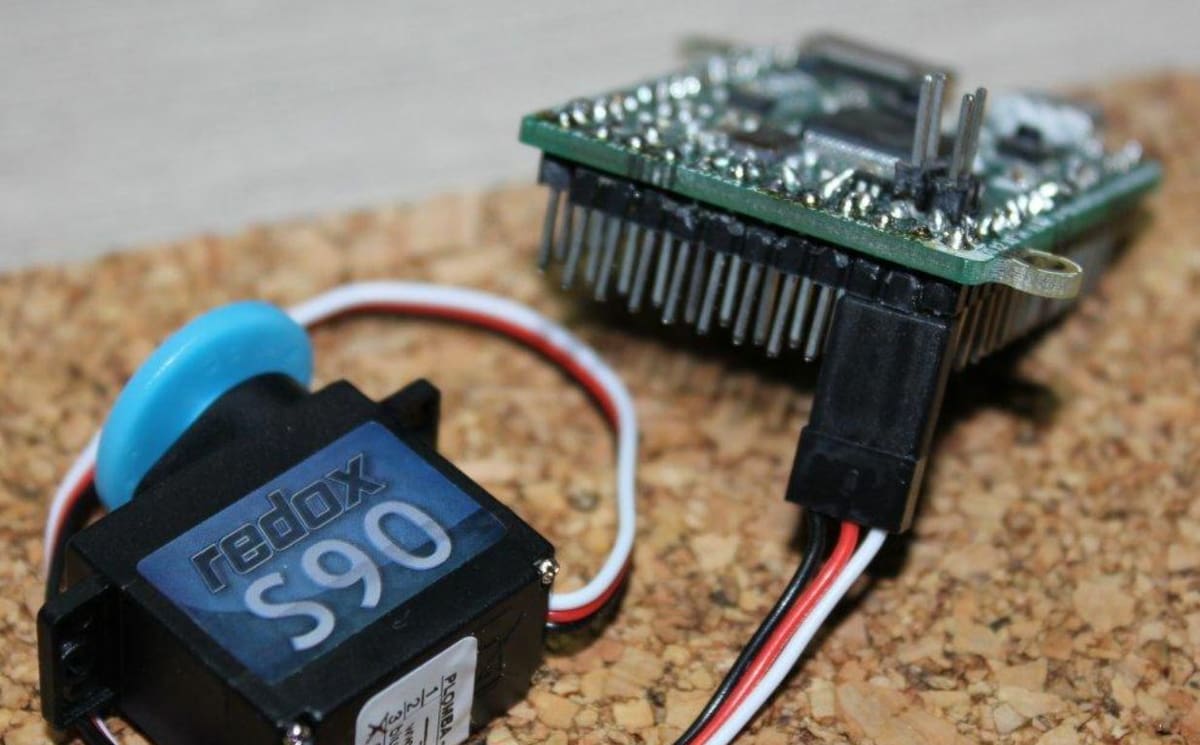 The Pyboard has GPIO ports that you can use to power and control items like a servo
