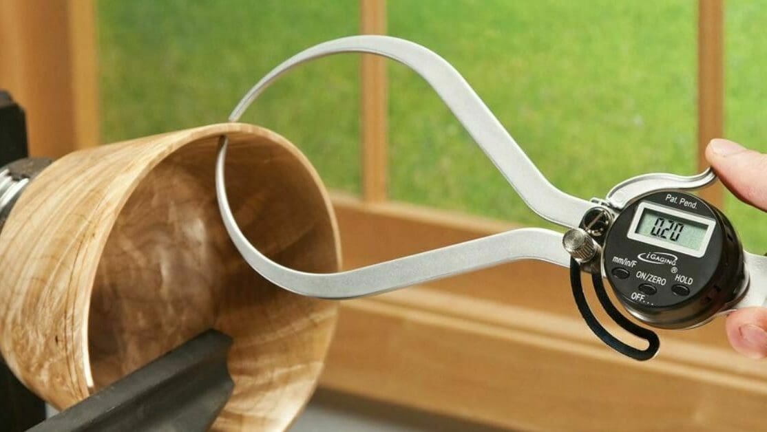 This device uses two prongs connected by a hinge-like mechanism