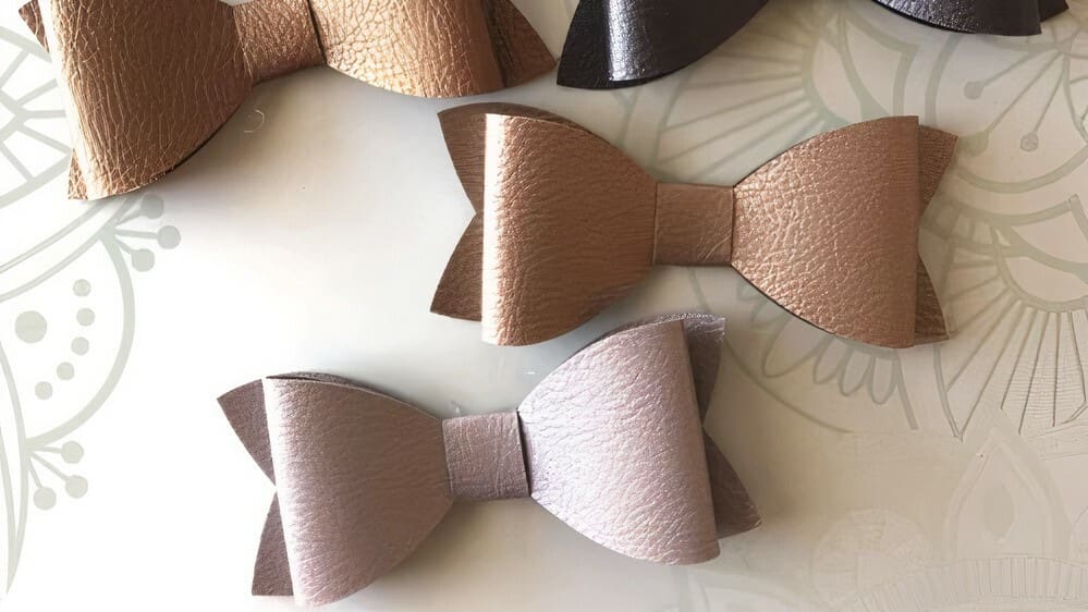 You can spruce up your hairstyle or even gift boxes with these faux leather bows