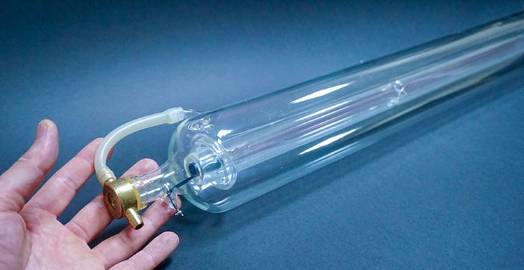 In some cases, a CO2 tube has a water cooling coil built into it to provide effective cooling