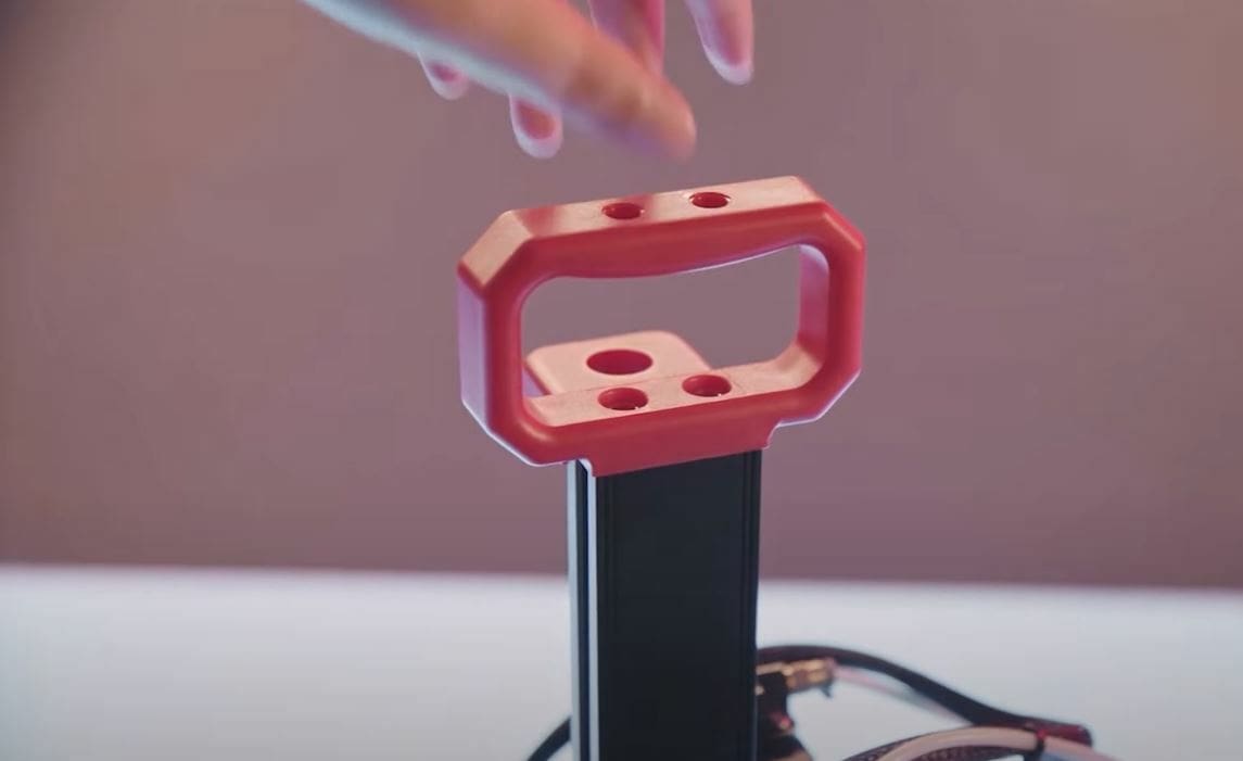 The Ender 2 Pro has a carrying handle on the top of its Z-axis extrusion
