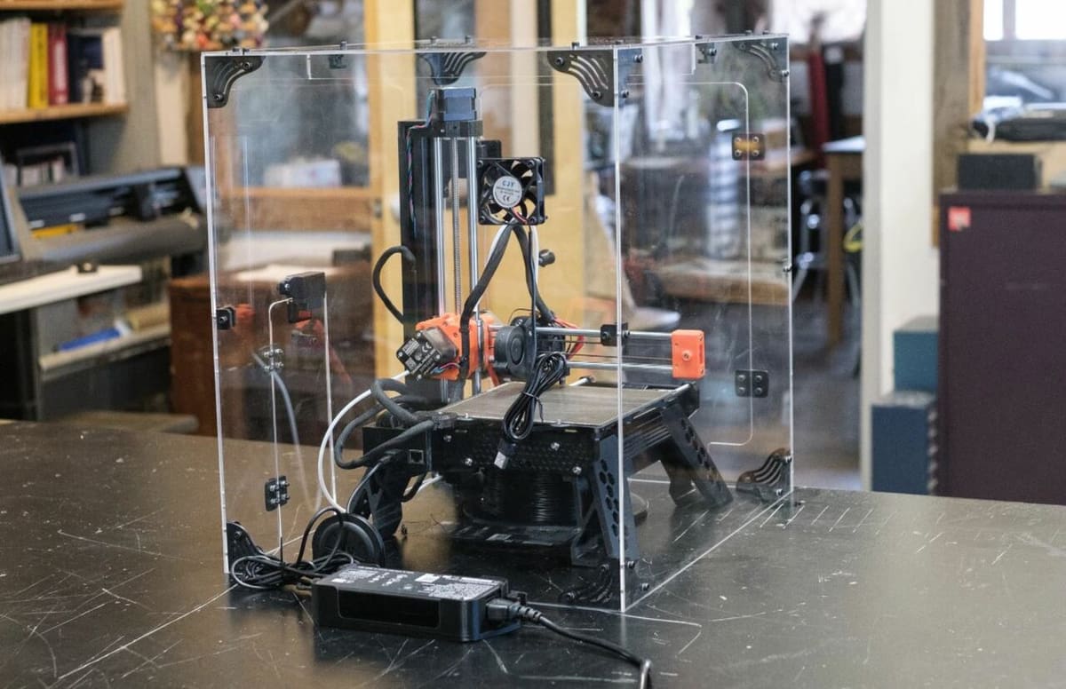 3DUpFitters offers an acrylic enclosure kit that fits the Prusa Mini+