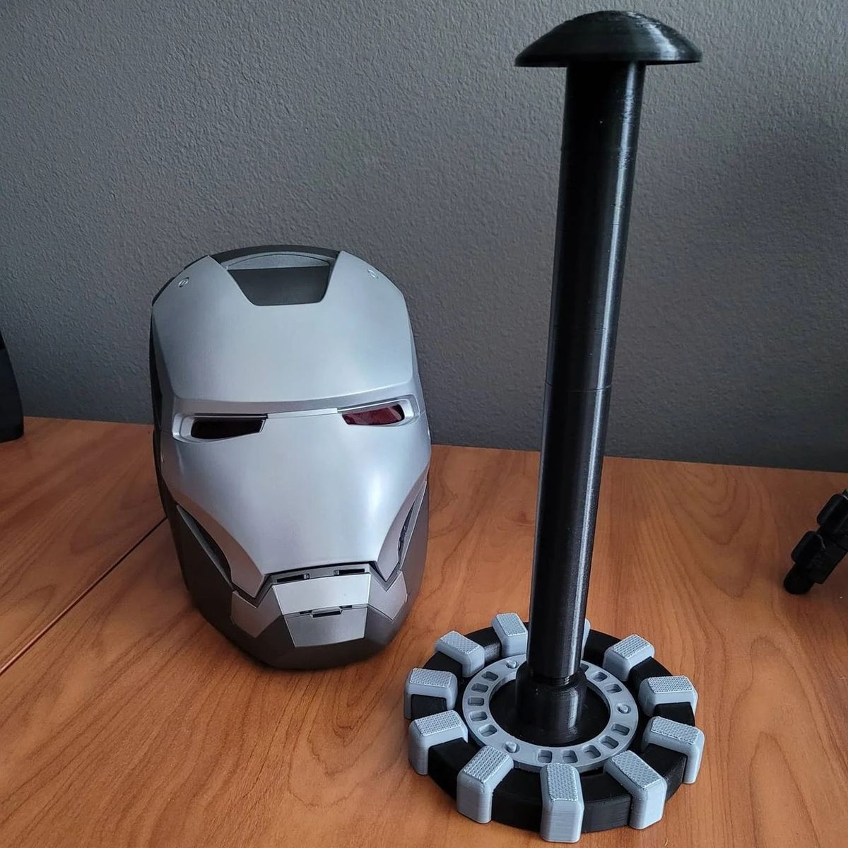 What better to show off your Iron Man helmets than the arc reactor?