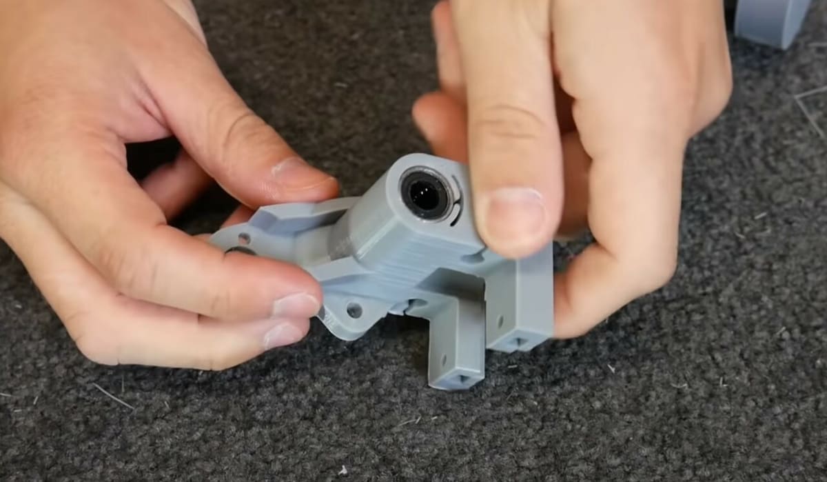 A bearing inserted with the aid of a compliant hole mechanism