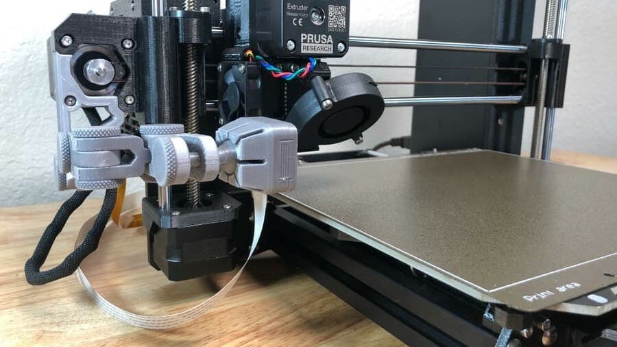 A monitoring camera allows you to remotely watch your printer