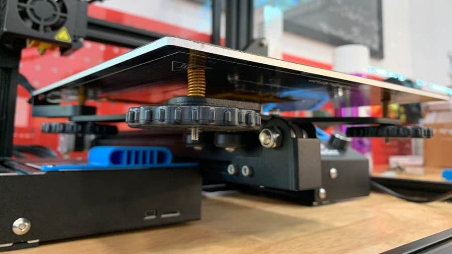 Using stronger springs can reduce vibrations on the build plate