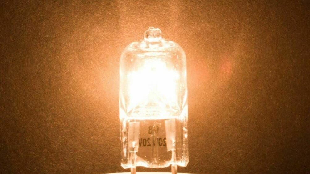 Halogen lamps produce heat by sending current through a wire