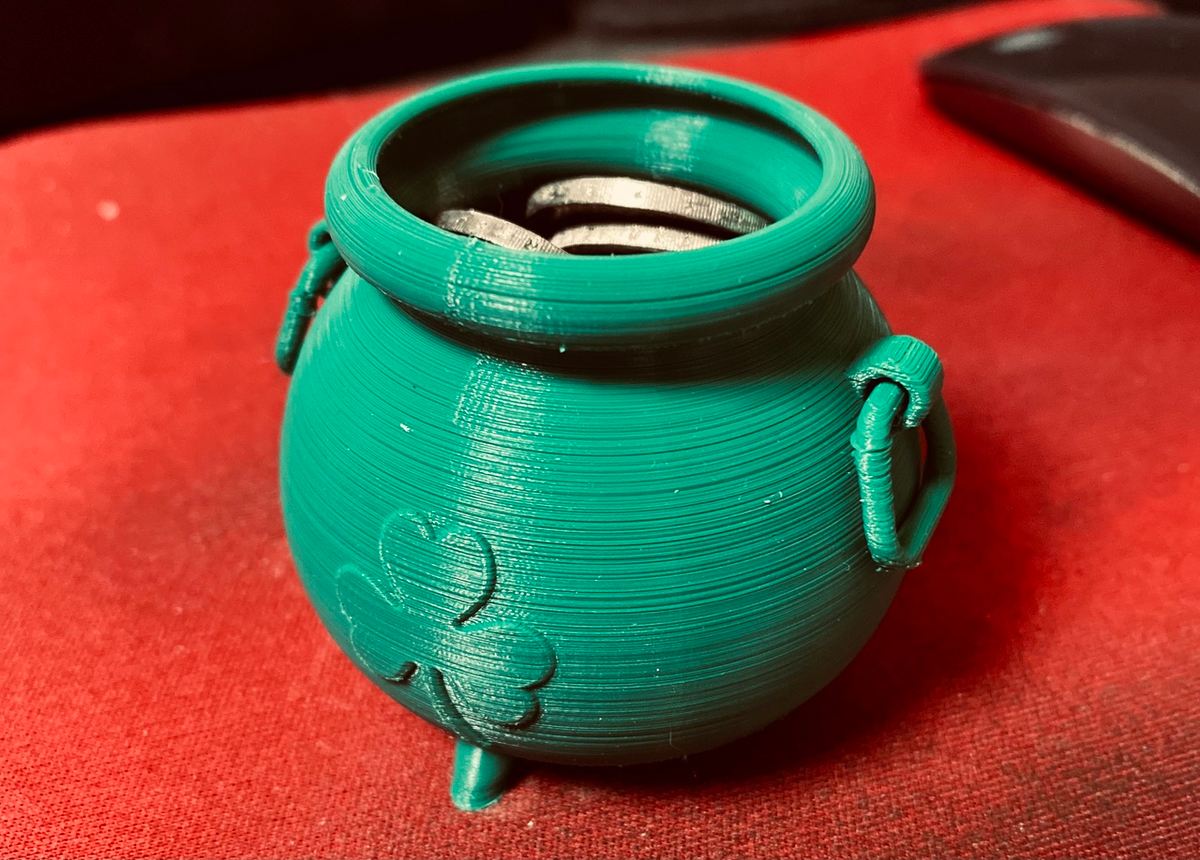 This small pot is a handy little storage container that's also decorative