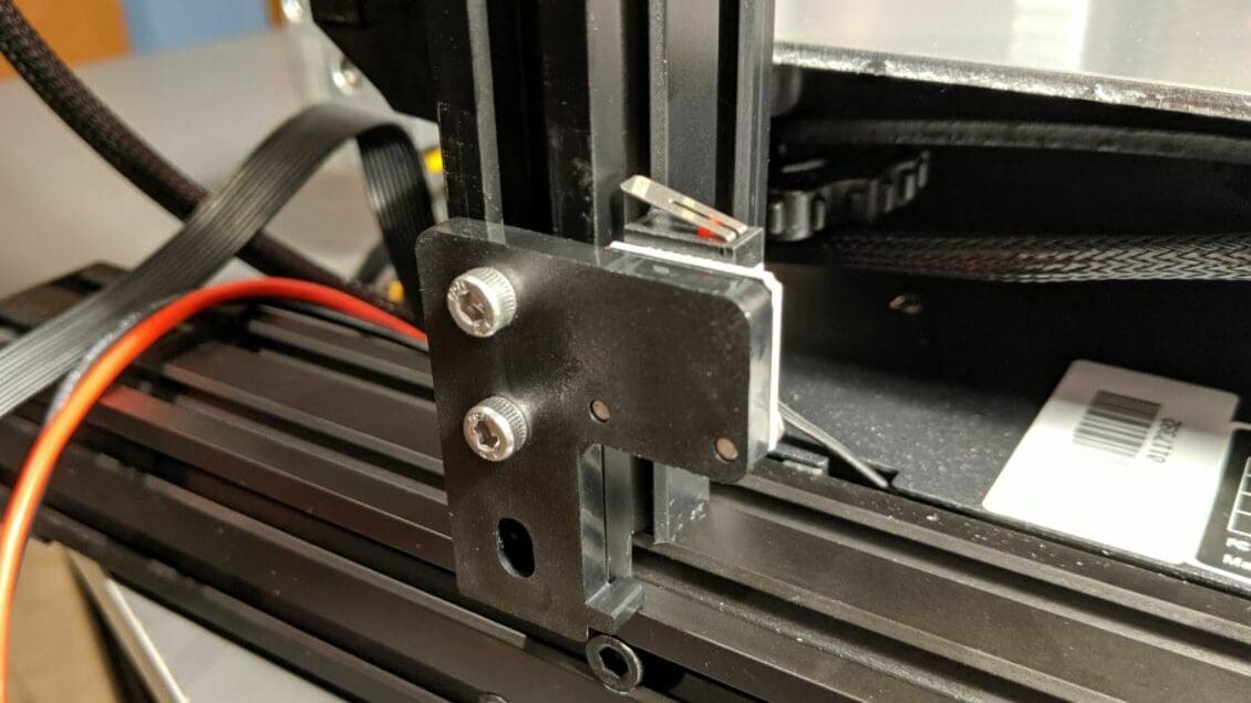 You can adjust the limit switch by loosening its two mounting screws