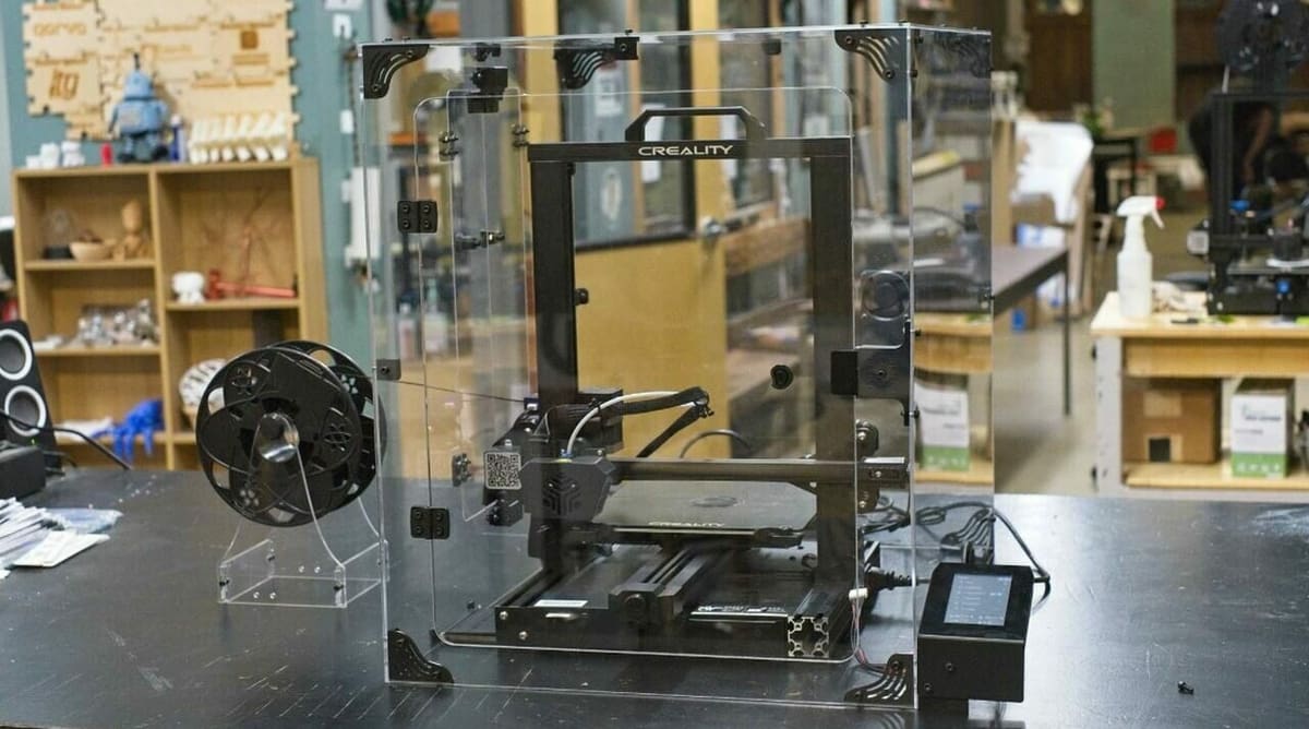 You can buy an enclosure for your CR-6 SE with built-in features like an external spool holder