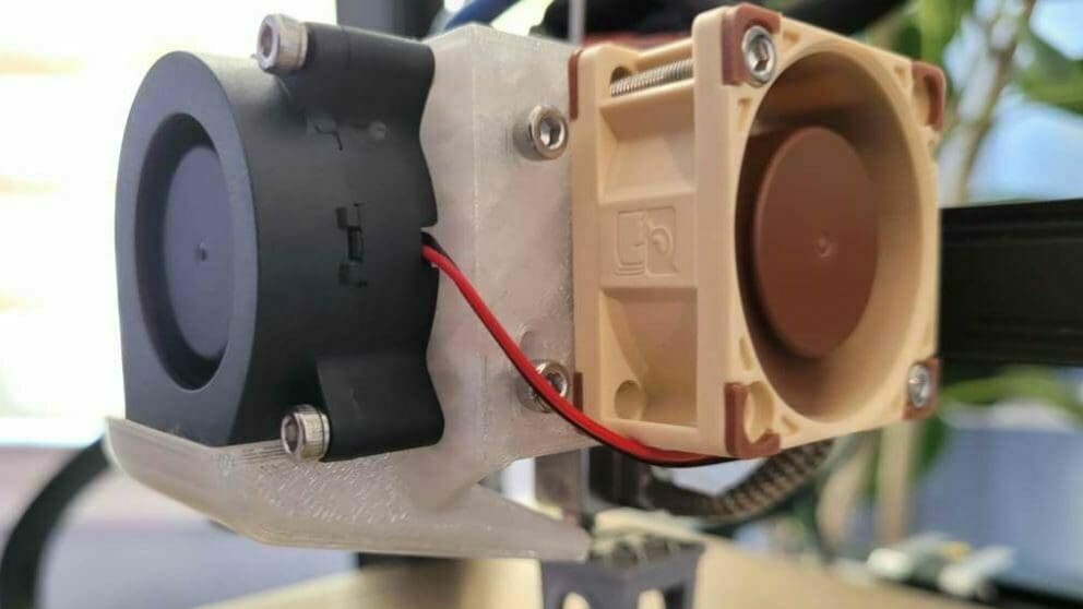 This fan duct will properly cool the filament that leaves the hot end