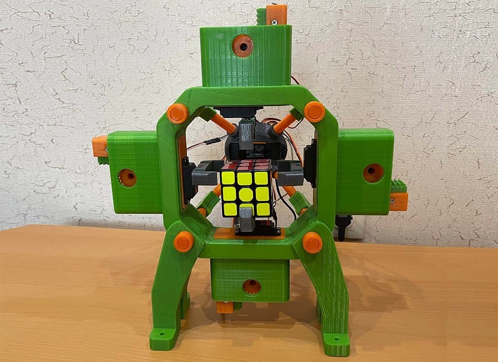 You don't need to know how to solve a Rubik's Cube, only how to program