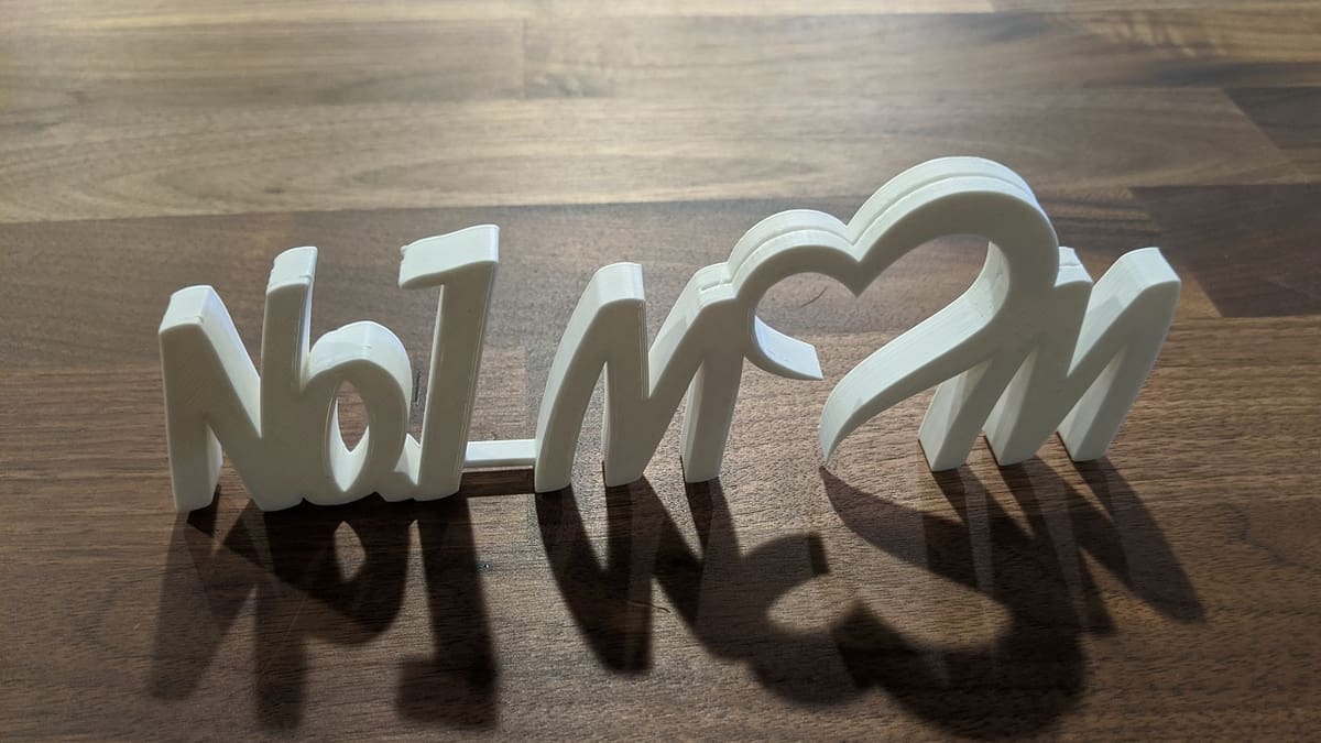 The cursive font connects the letters so there's only one print