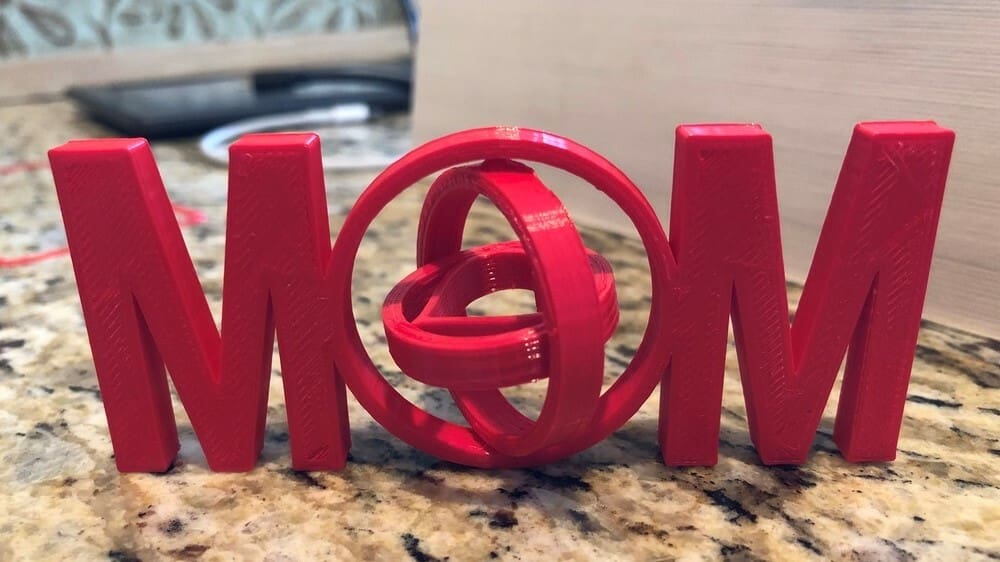 The rings of the gimbal mechanism can be popped out after printing