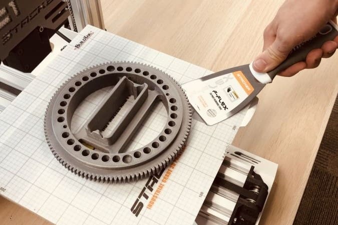 A print-removal blade can help carefully dislodge prints from the build plate
