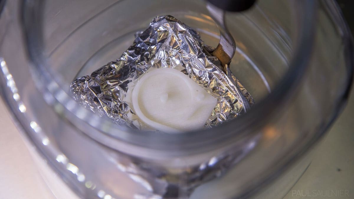 The aluminum foil serves as an isolation layer between the bottom of the container and the part