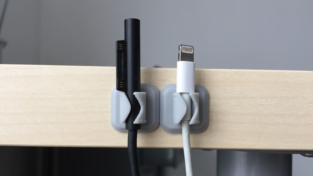 This cable holder fits Lightning charger wires and other USB cables