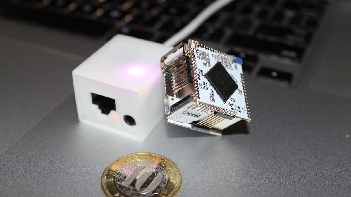The VoCore 2 chip side to side with a 10 Yuan coin