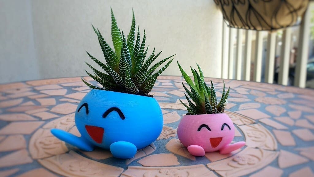 Some happy Oddishes looking after zebra cacti