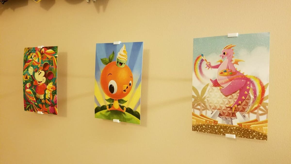 Hang pictures on your walls without bulky frames