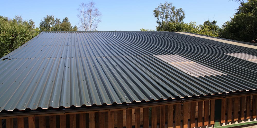 The roof of this house is made of bendt sheets of metal