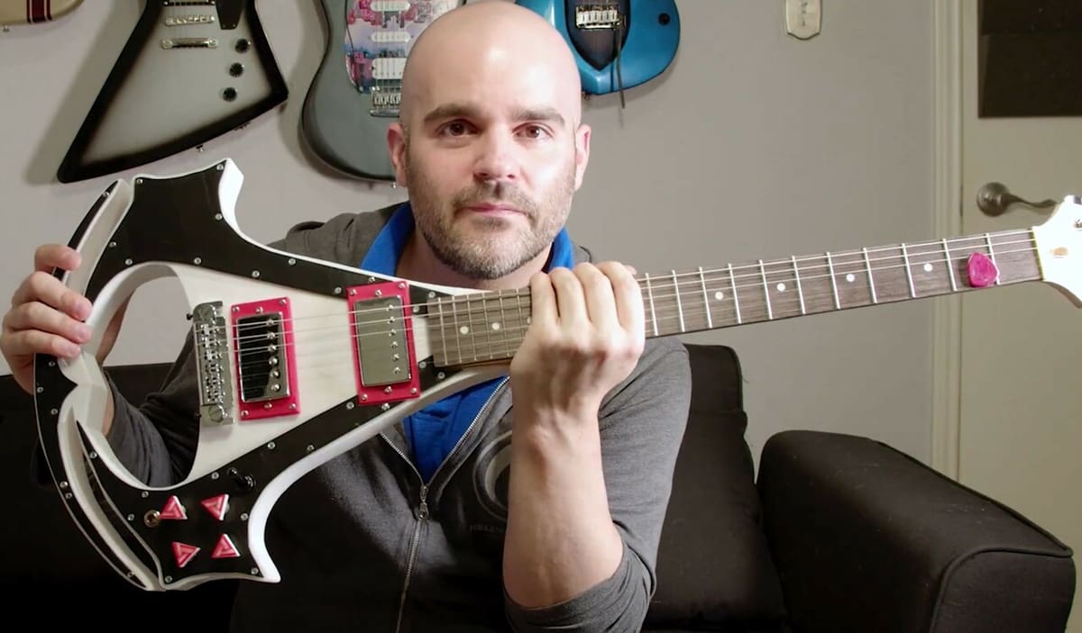 Who knew the mark of the Assassins could convert into a V guitar?