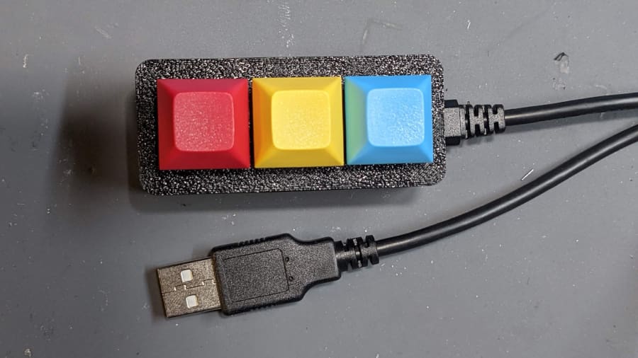 Each button in the Macropad performs a different action in Zoom conferences