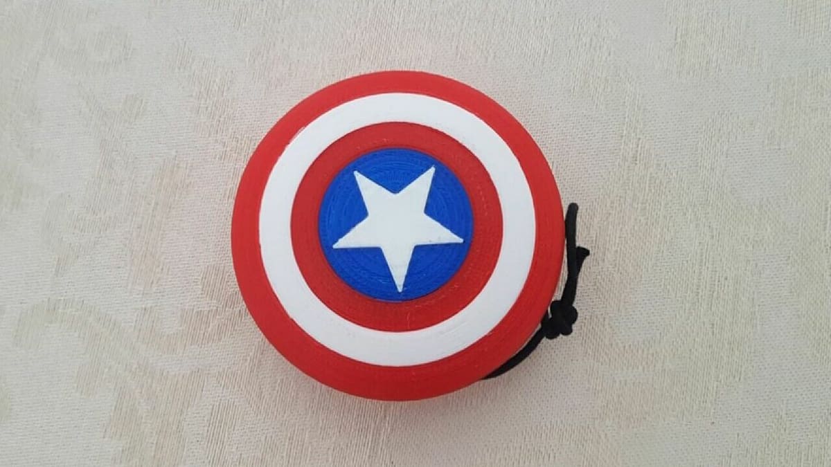 This yo-yo is comprised of four 3D prints and a roll of string