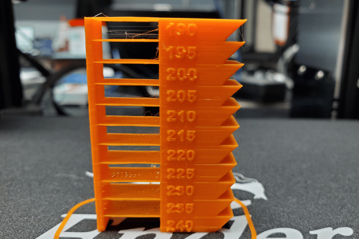 This temperature tower is printed in bright orange PLA