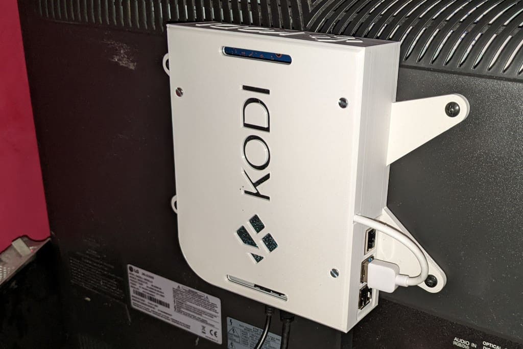 The Kodibox is mountable so you can keep it accessible but out of sight