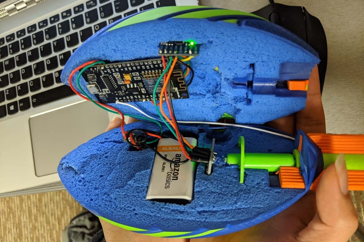 A NodeMCU board is embedded inside of the Smart Football