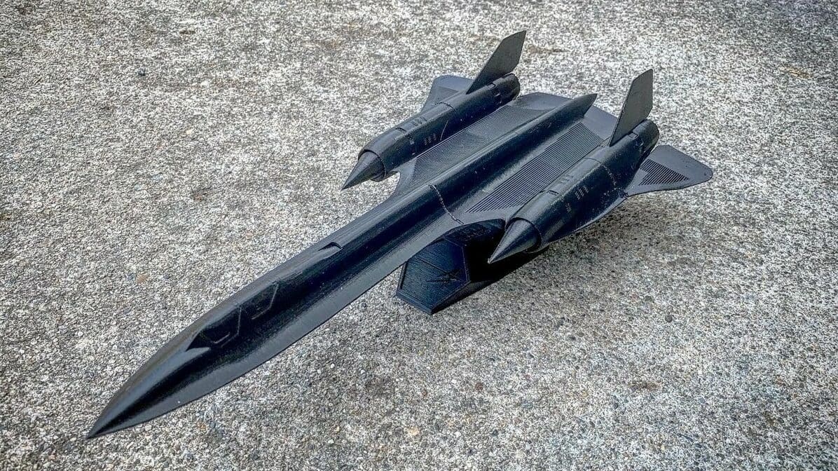 Lockheed Martin's SR-71A Blackbird on a low-poly model plane stand
