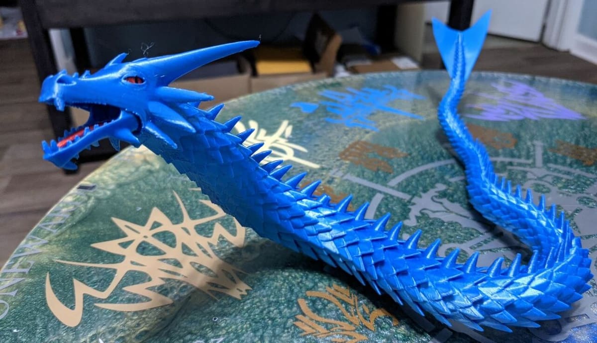 You can adjust the position of the dragon by moving its 20+ joints