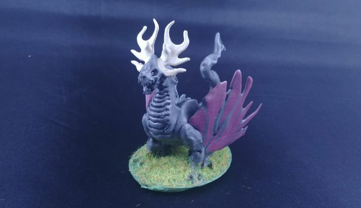 Adding grass to the base makes the dragon look more realistic
